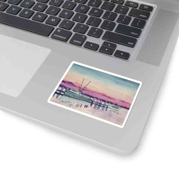 Boat watercolor art sticker on laptop keyboard, creative office decor, artistic laptop sticker, Impartial Inc. branding.