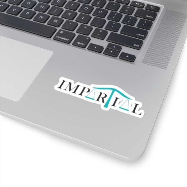 Clear justice scales integrated into "IMPARTIAL" logo on a laptop sticker.