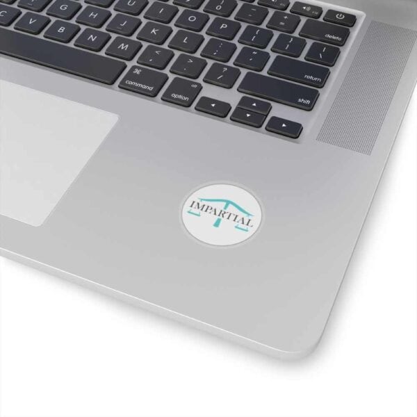 Transparent laptop with Impartial logo promoting unbiased AI and technology solutions.